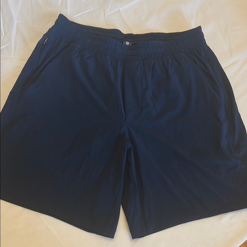 Men’s Lululemon Athletica Navy Blue Lined Shorts- Size M like new. Inseam 7 inch